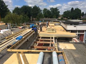 Foto 11 van het album Renovatie daken CBS de Schutkampen Smilde